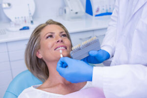 women getting her teeth whitened