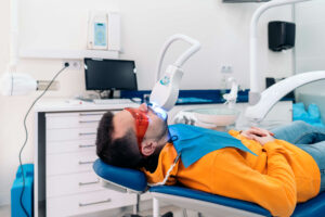 man getting his teeth whitened