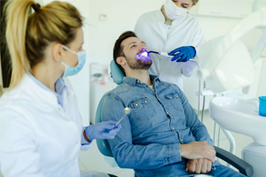 man getting his teeth whitened