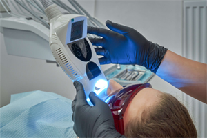 man getting his teeth whitened.